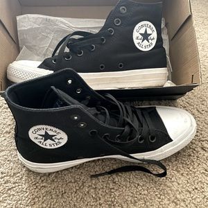 Chuck Taylor all stars…Black and white high top converse shoes